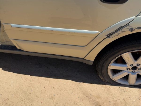 05-09 Legacy Outback Driver Left Rear Lower Moulding From Door Oem Gold 9J — photo 1