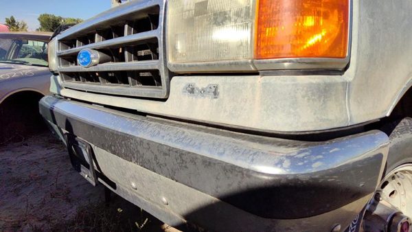 1987-1991 Ford F150 Lower Panel Below Grille Trim Filler Strip Oem — photo 1