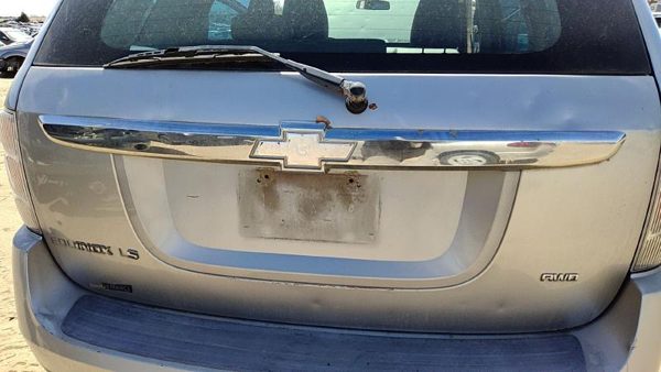 05-09 Equinox License Plate Trim Surround Panel Oem Tail Trunk Finish Silver 67U — photo 1