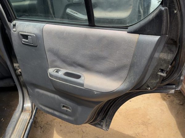 1998 Isuzu Rodeo Passenger Right Rear Door Trim Panel With Switches Back — photo 1