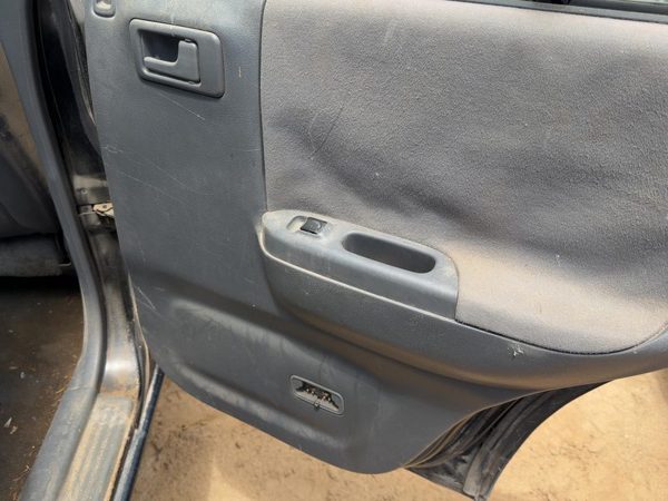 1998 Isuzu Rodeo Passenger Right Rear Door Trim Panel With Switches Back — photo 2