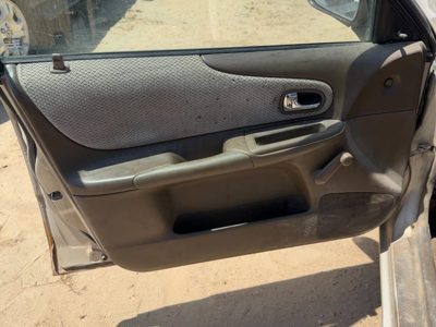 1999-2000 Mazda Protege Dx Driver Left Front Door Trim Panel Manual Brown