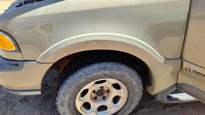 98-99 Lincoln Navigator Driver Left Front Wheel Flare Moulding Fender Gold Bi
