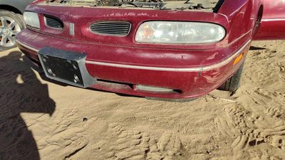 1996-1999 Olds 88 Front Bumper Cover Assembly Oem Red 25644009