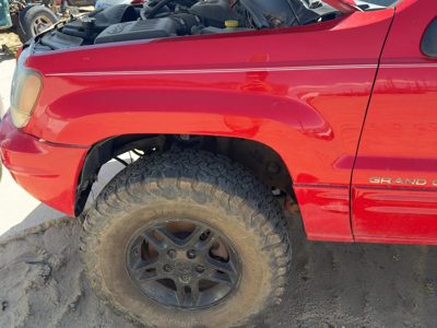 1999-2004 Jeep Grand Cherokee Driver Left Front Fender Oem Flame Red Pr4