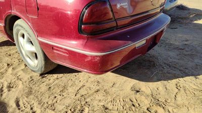 1996-1999 Olds 88 Rear Bumper Cover Assembly Oem Back Red 25644010