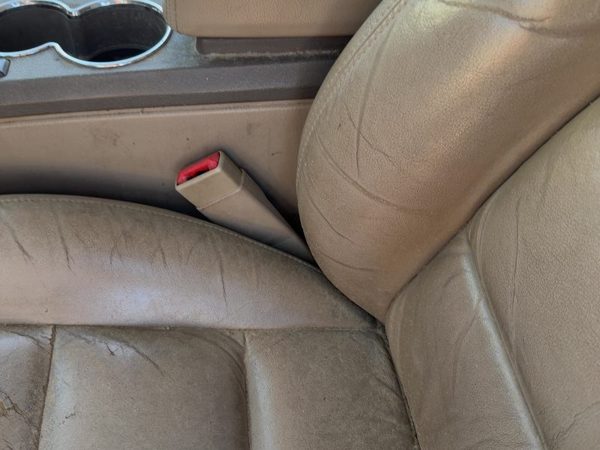2001 Lincoln LS Driver Left Front Seat Belt Buckle Receiver OEM Tan 4H — photo 1