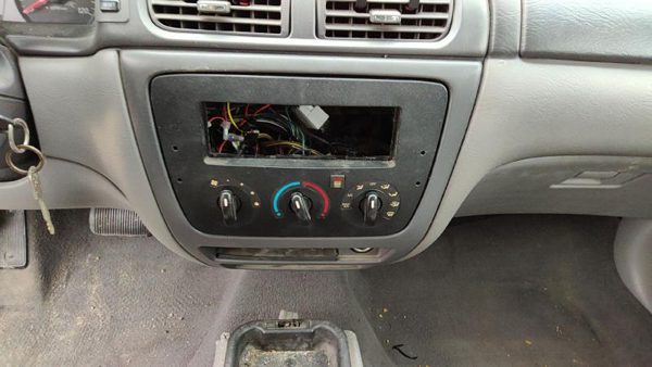 2005 Ford Taurus Radio Bezel Trim — photo 1
