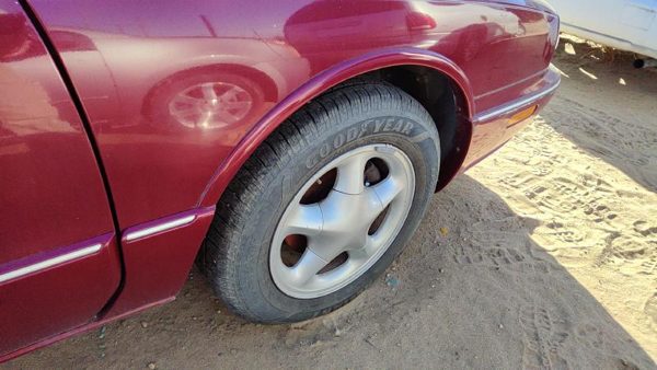 96-99 Olds 88 Passenger Right Fender Flare Moulding Oem Red — photo 4