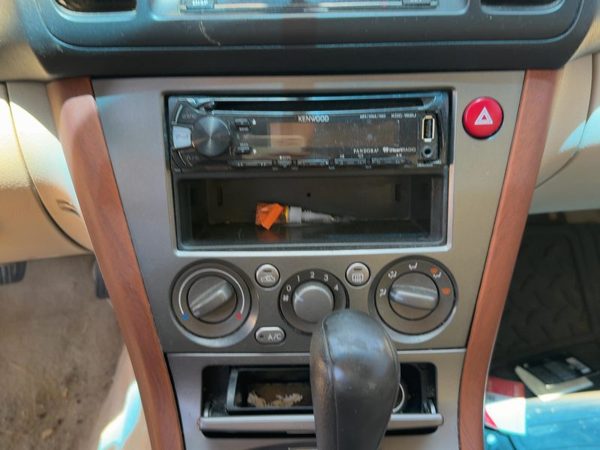 2005-2007 Subaru Legacy Outback Radio Trim Bezel Surround Taupe OEM 66040AG02A — photo 3
