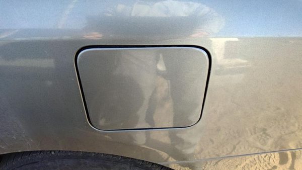 2012-2019 Nissan Versa Fuel Tank Door With Hinge Gas Lid Oem Filler Gray Kad — photo 2