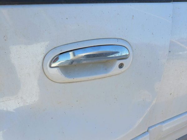 1998 Lincoln Navigator Outside Door Handle LH Oxford White Yz — photo 1