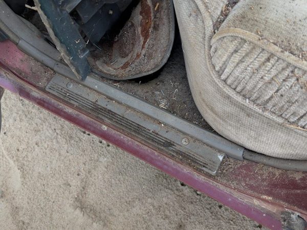 1985-1988 Nissan Maxima Sedan Driver Left Rear Sill Step Trim Plate OEM — photo 1