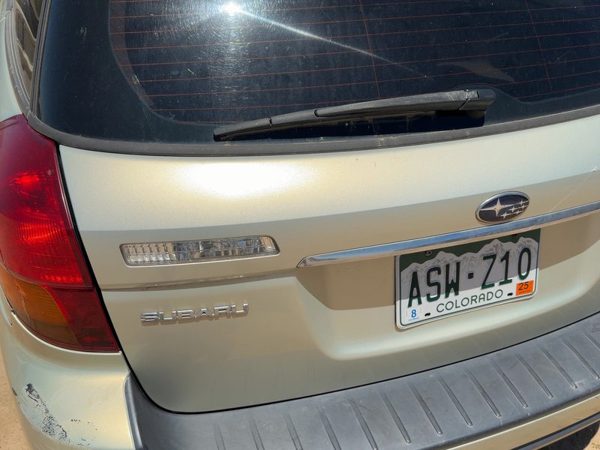 05-09 Legacy Outback License Plate Trim Surround Panel Tail Trunk Finish Gold 9J — photo 2