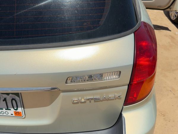 05-09 Legacy Outback License Plate Trim Surround Panel Tail Trunk Finish Gold 9J — photo 3