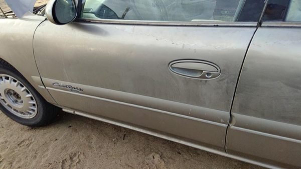 1997 Buick Century Front Door LH Silver — photo 1
