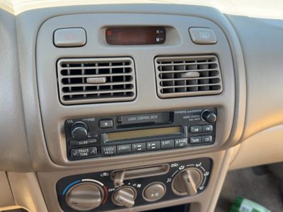 98-02 Toyota Corolla Trim Bezel Around Radio Surround Dash Panel Oem Beige Fa40
