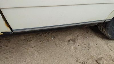 79-85 Mercedes 300Td Driver Left Rear Lower Moulding From Door Back Trim Strip