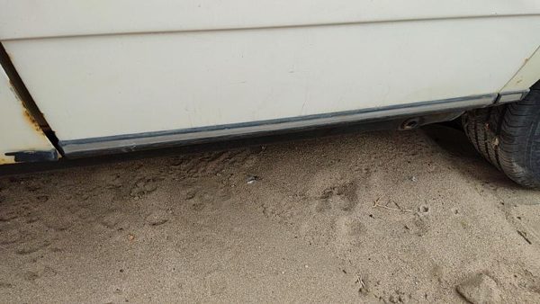 79-85 Mercedes 300Td Driver Left Rear Lower Moulding From Door Back Trim Strip — photo 1