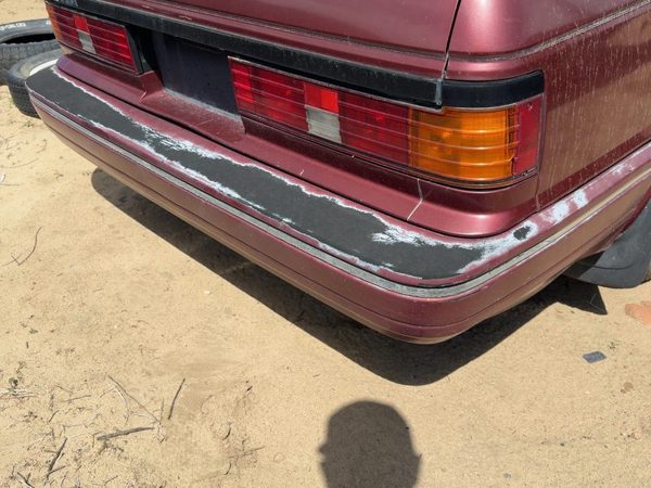 1987-1988 Nissan Maxima Rear Bumper Cover Assembly Oem Back Red 8502232E25 — photo 3