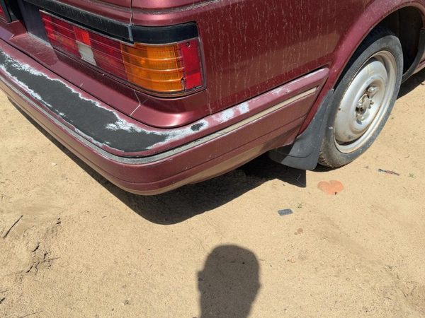 1987-1988 Nissan Maxima Rear Bumper Cover Assembly Oem Back Red 8502232E25 — photo 4