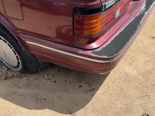 1987-1988 Nissan Maxima Rear Bumper Cover Assembly Oem Back Red 8502232E25 — photo 8