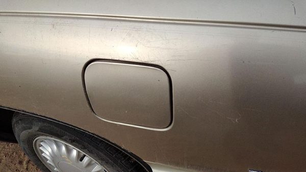 91-96 Buick Park Ave Fuel Tank Door With Hinge Gas Lid Oem Filler Gold — photo 1