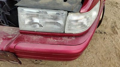 99-02 Cadillac Eldorado Driver Left Trim Strip Below Headlight Crimson Red 86U