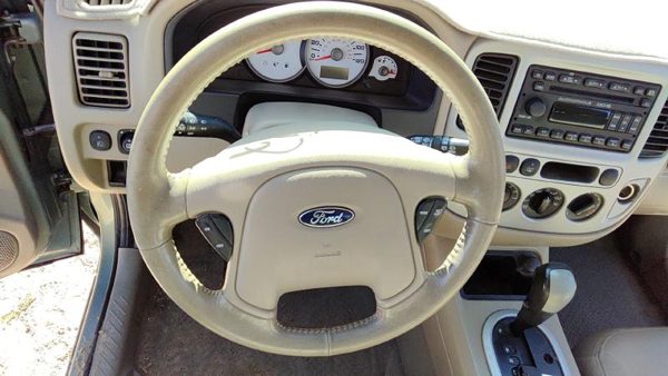 2007 Ford Escape Steering Wheel OEM Nh Dark Pebble Tan — photo 1