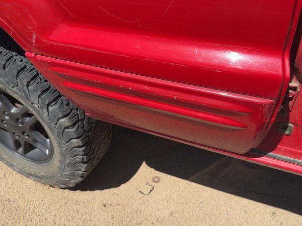 99-04 Grand Cherokee Passenger Right Rear Moulding From Door Back Trim Strip Fla — photo 1
