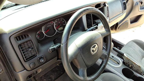 2005 Mazda Tribute Steering Wheel OEM ef9257k0070 — photo 1