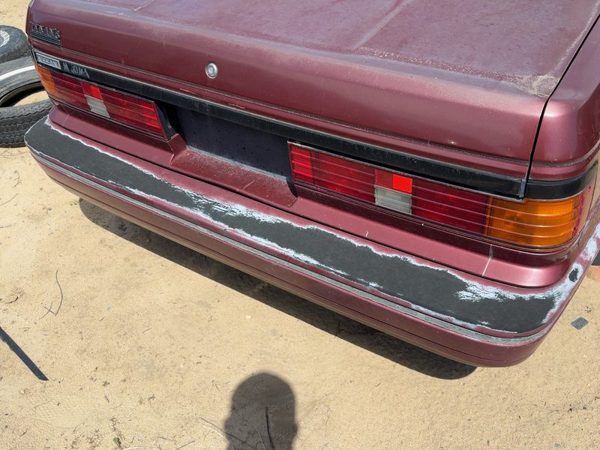 86-88 Maxima License Plate Trim Surround Panel Oem Tail Trunk Finish Sdn Red — photo 1