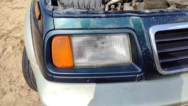 96-97 Suzuki Sidekick Passenger Right Headlight Trim Surround Panel Green Sort — photo 2