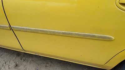 2000-2005 Dodge Neon Driver Left Rear Moulding From Door Back Trim Strip Yellow