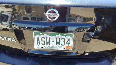 07-09 Sentra License Plate Trim Surround Panel Oem Tail Trunk Finish Black Kh3
