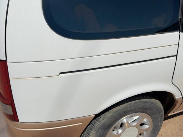96-98 Mercury Villager Right Rear Quarter Moulding Door Roller Cover Trim — photo 1