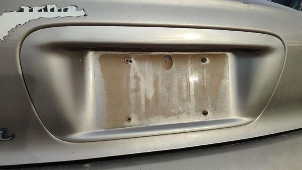 95-99 Contour License Plate Trim Surround Panel Tail Trunk Finish Dk Champagne — photo 2