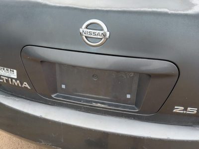 05 Altima License Plate Trim Surround Panel Oem Tail Trunk Finish Smoke K11