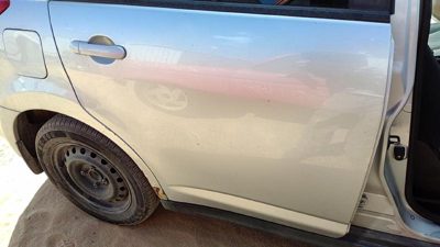 2010 Nissan Versa Rear Door RH Silver K23