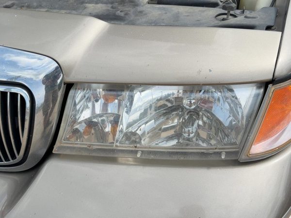 2002 Mercury Grand Marquis Headlamp Assembly LH — photo 1