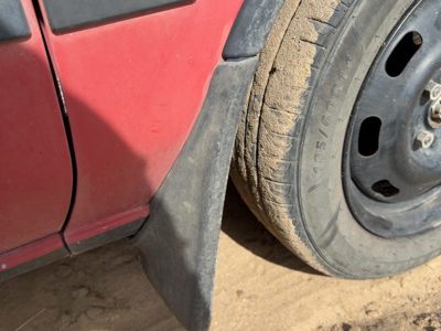 1987-1988 Toyota FX Passenger Right Moulding From Fender OEM Mud Flap