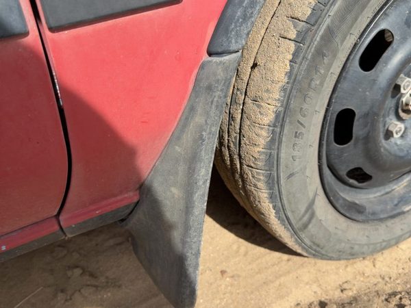 1987-1988 Toyota FX Passenger Right Moulding From Fender OEM Mud Flap — photo 1