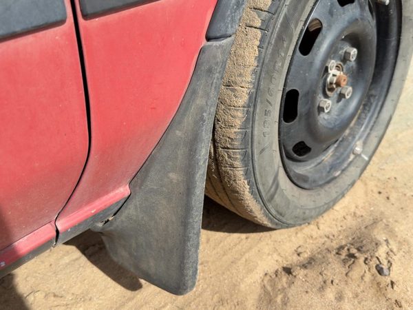1987-1988 Toyota FX Passenger Right Moulding From Fender OEM Mud Flap — photo 2