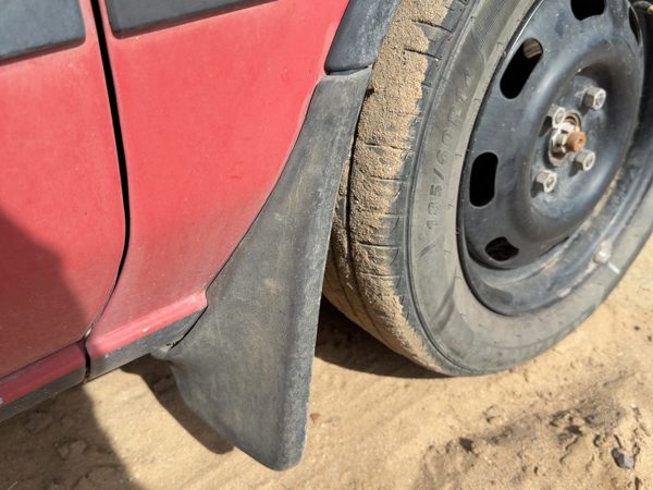 1987-1988 Toyota FX Passenger Right Moulding From Fender OEM Mud Flap — photo 4