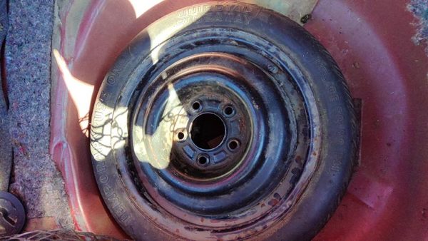 1988-1994 Grand Prix Compact Spare Donut Wheel And Tire Oem 09591237 — photo 1