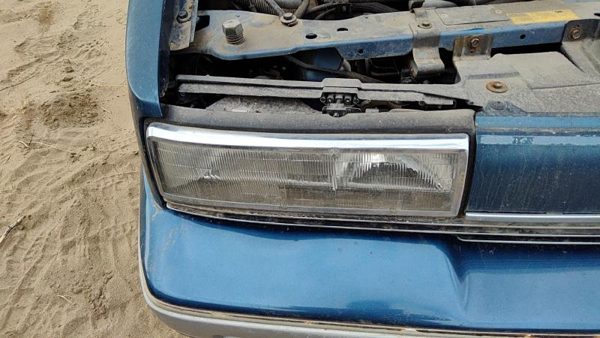 1989 Olds Calais Headlamp Assembly RH — photo 1