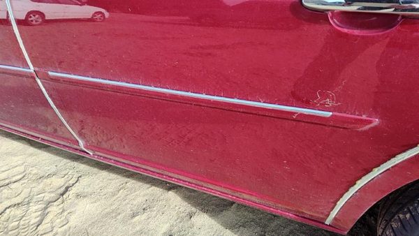 06-07 Lucerne Driver Left Rear Moulding From Door Back Trim Strip Crimson 86U — photo 1