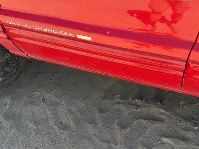 99-04 Grand Cherokee Driver Front Moulding From Door Trim Strip Flame Red Pr4