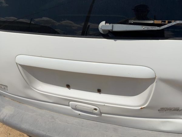 96-99 Town & Country License Plate Trim Surround Panel Tail Trunk Finish 119" Wb — photo 1