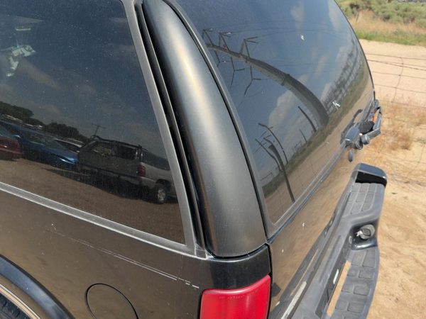 1998-2005 Chevy S10 Blazer 4 Door Driver Left Rear Upper Corner Trim Panel — photo 1